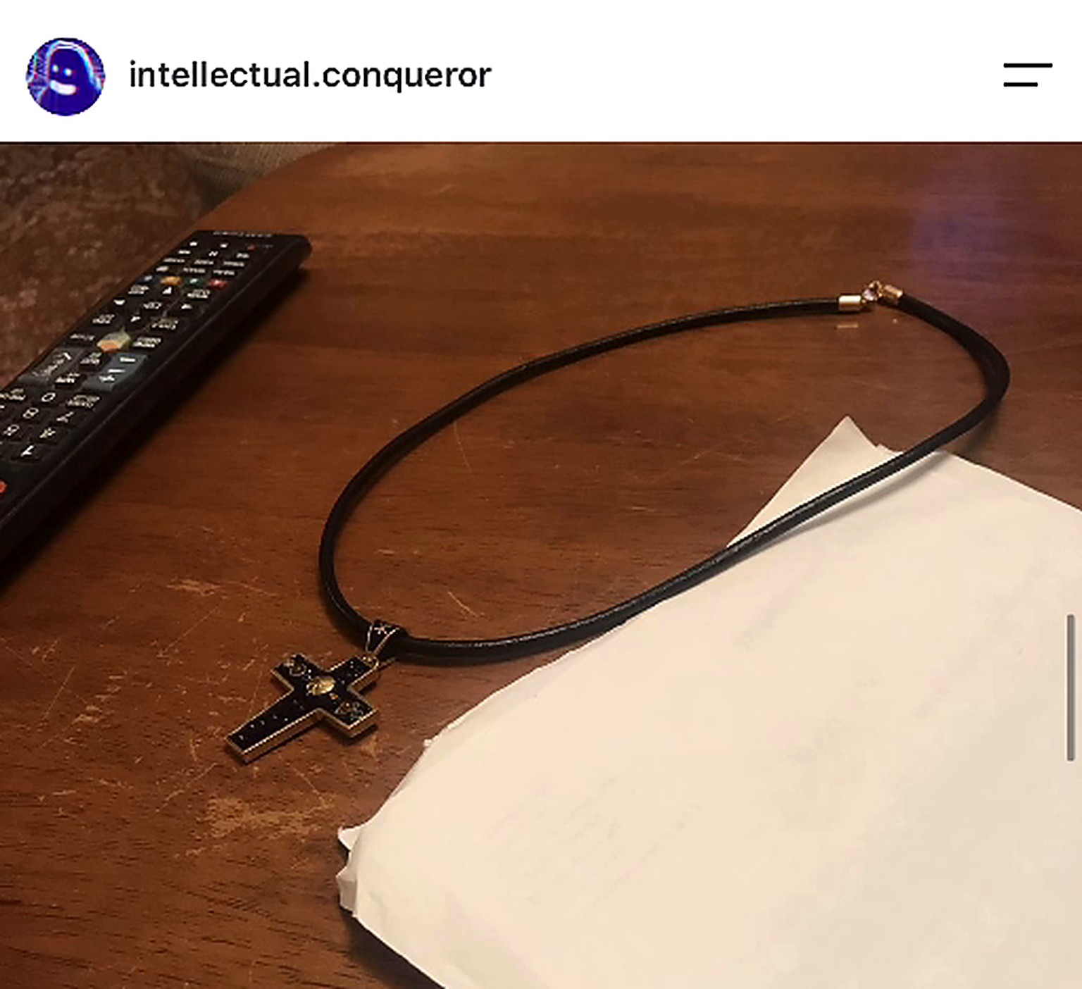 Cross pendant on leather chain