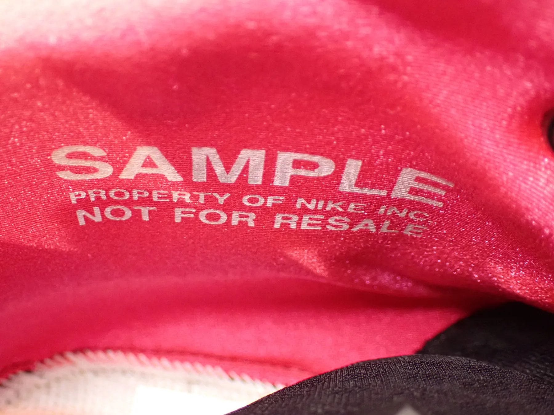 Nike sample property of Nike Inc not for resale printed inside tongue